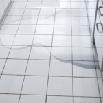 Kitchen floor with water leaks.