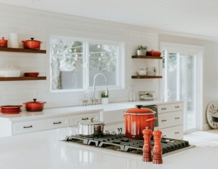 Kitchen with Crockery Pots and white furnishings